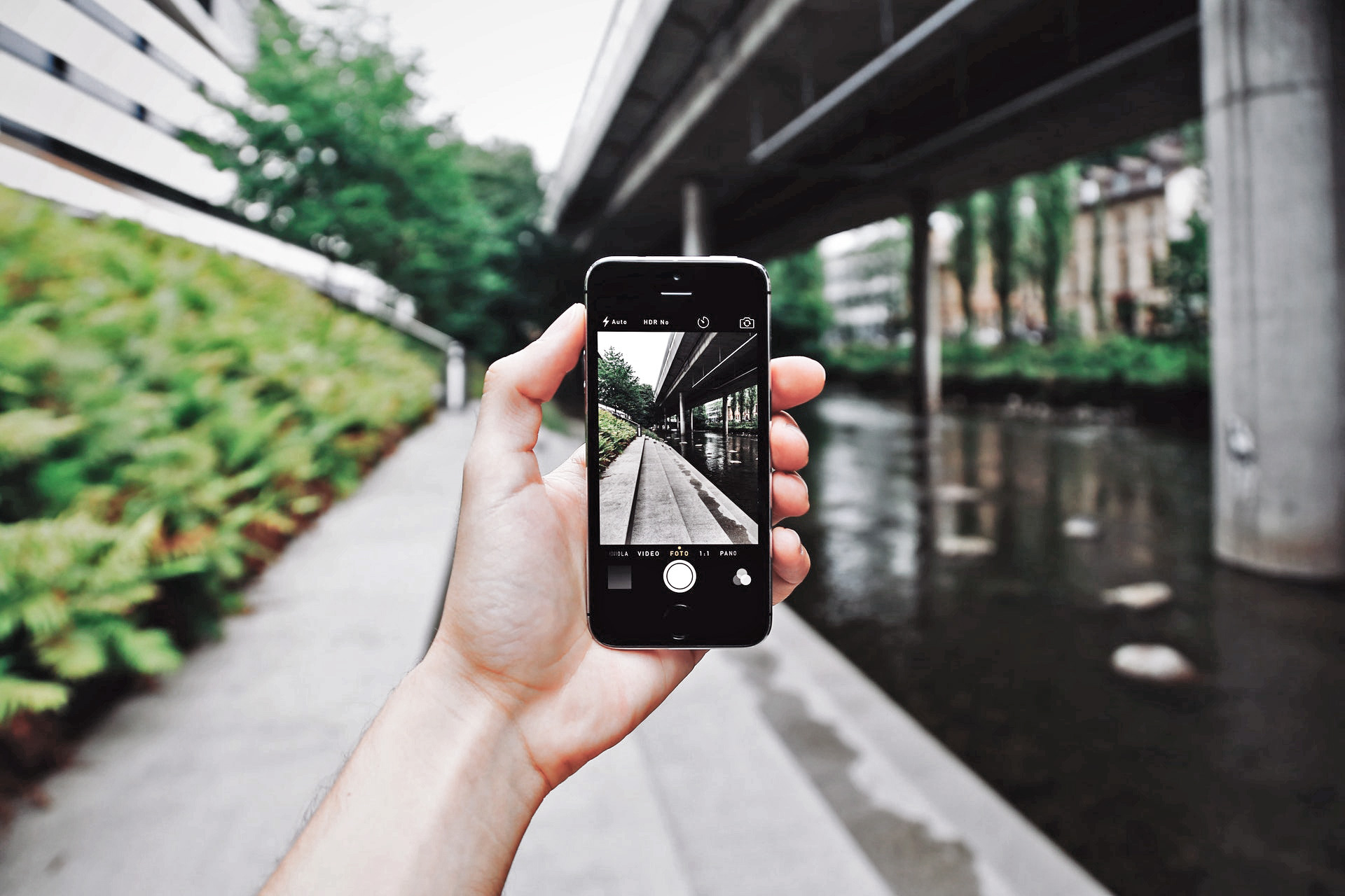 person-using-camera-of-space-grey-iphone-6-861096_banner